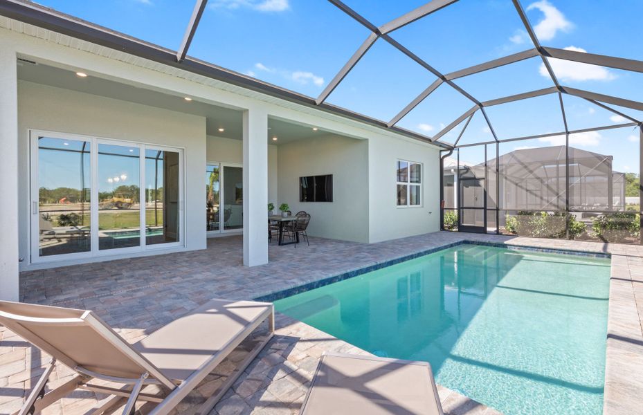 Screened-in pool and covered lanai Screened-in pool and covered lanai