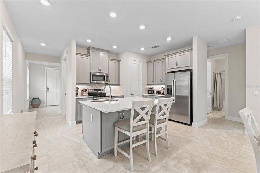 Furnished interior view inside a new home in , Poinciana (Image 12).