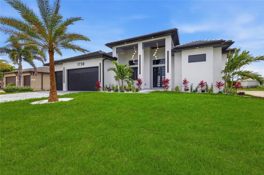Front exterior of a new home in , Cape Coral, FL, highlighting curb appeal (Image 25).