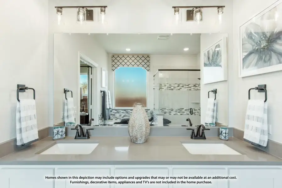 Bathroom with double sink vanity, large mirror, and walk-in shower with tile accents Bathroom with double sink vanity, large mirror, and walk-in shower with tile accents