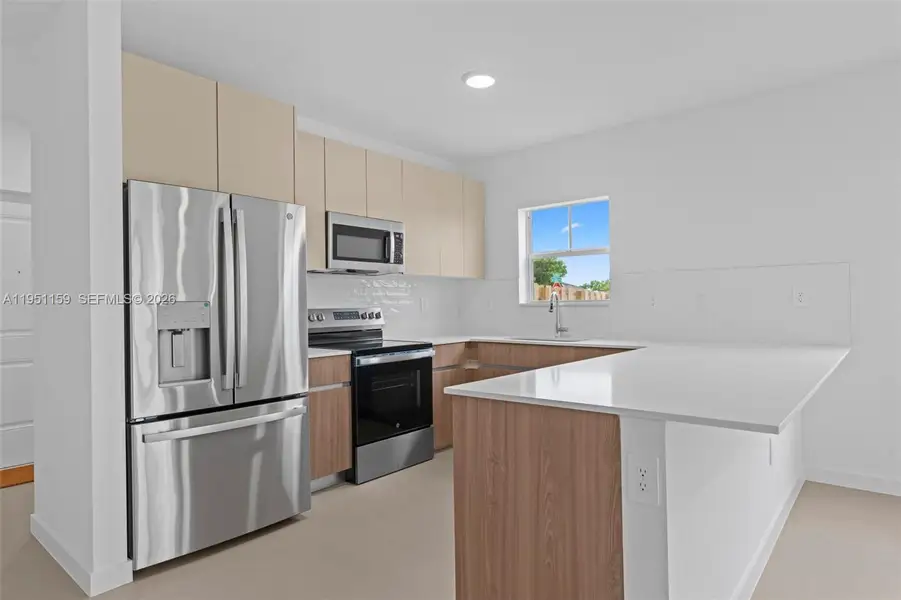 Furnished interior view inside a new home in , Homestead (Image 2). Furnished interior view inside a new home in , Homestead (Image 2).