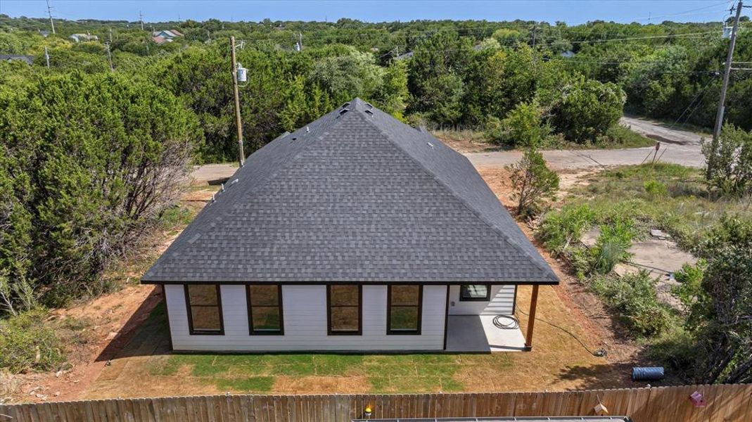 Front exterior of a new home in , Granbury, TX, highlighting curb appeal (Image 16). Front exterior of a new home in , Granbury, TX, highlighting curb appeal (Image 16).