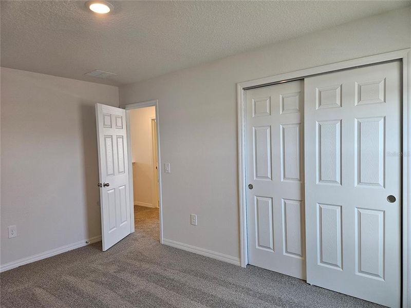 Spacious, unfurnished interior of a new home in Lawson Dunes - Signature Series, Haines City (Image 35).