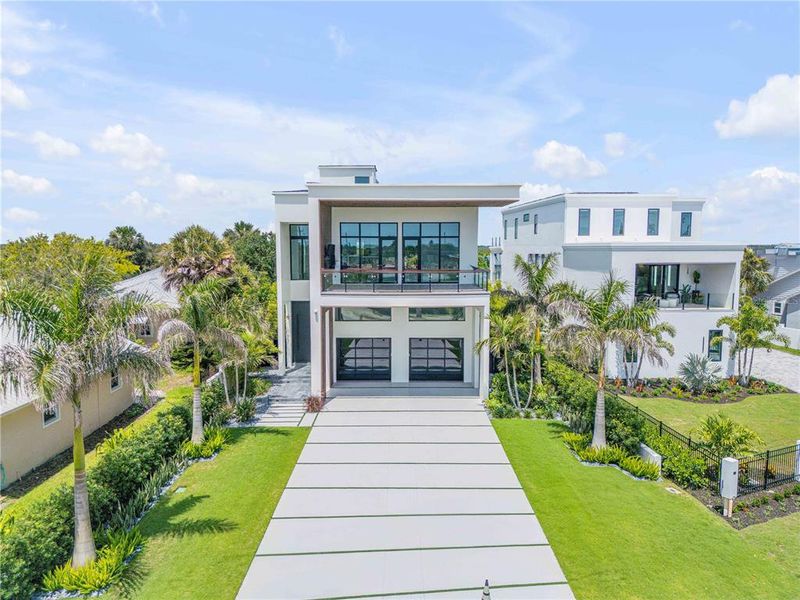 Front exterior of a new home in , New Smyrna Beach, FL, highlighting curb appeal (Image 18). Front exterior of a new home in , New Smyrna Beach, FL, highlighting curb appeal (Image 18).