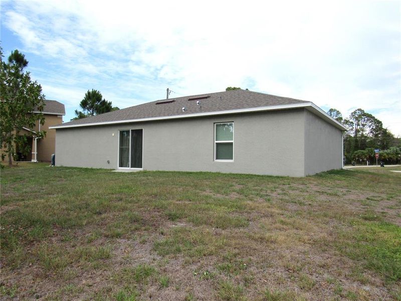 Exterior details and patio area of a home in , North Port (Image 15).