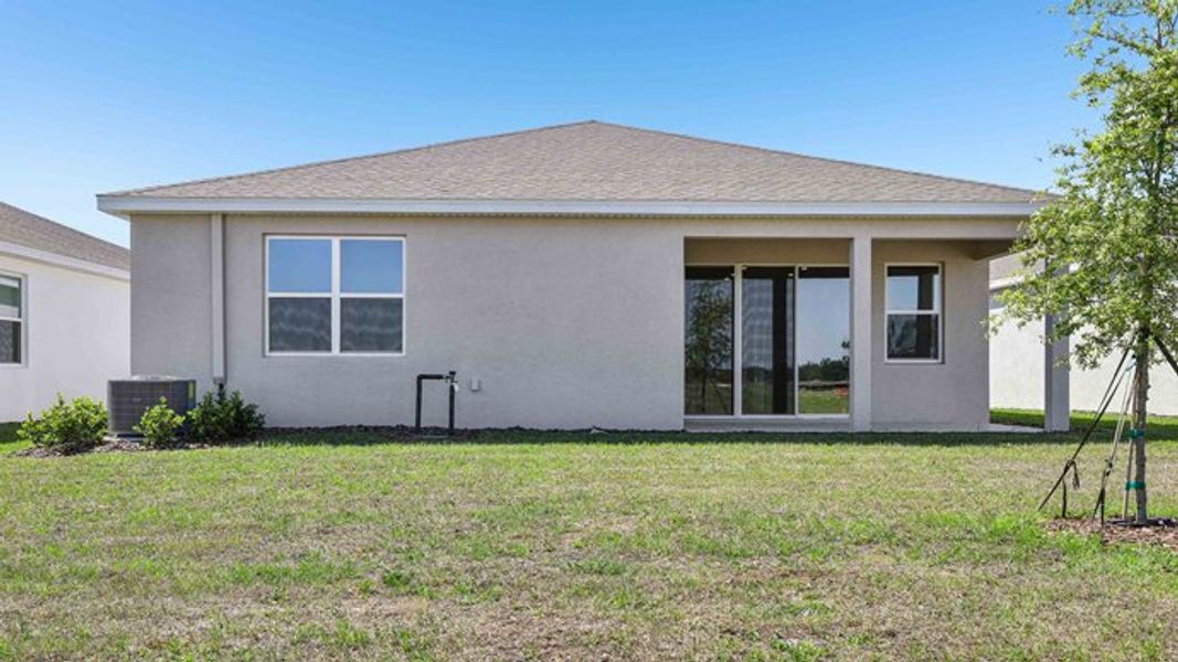 Representative exterior photo of a completed home built from the Laurel by D.R. Horton in Twisted Oaks, Wildwood, FL (Image 2). Representative exterior photo of a completed home built from the Laurel by D.R. Horton in Twisted Oaks, Wildwood, FL (Image 2).