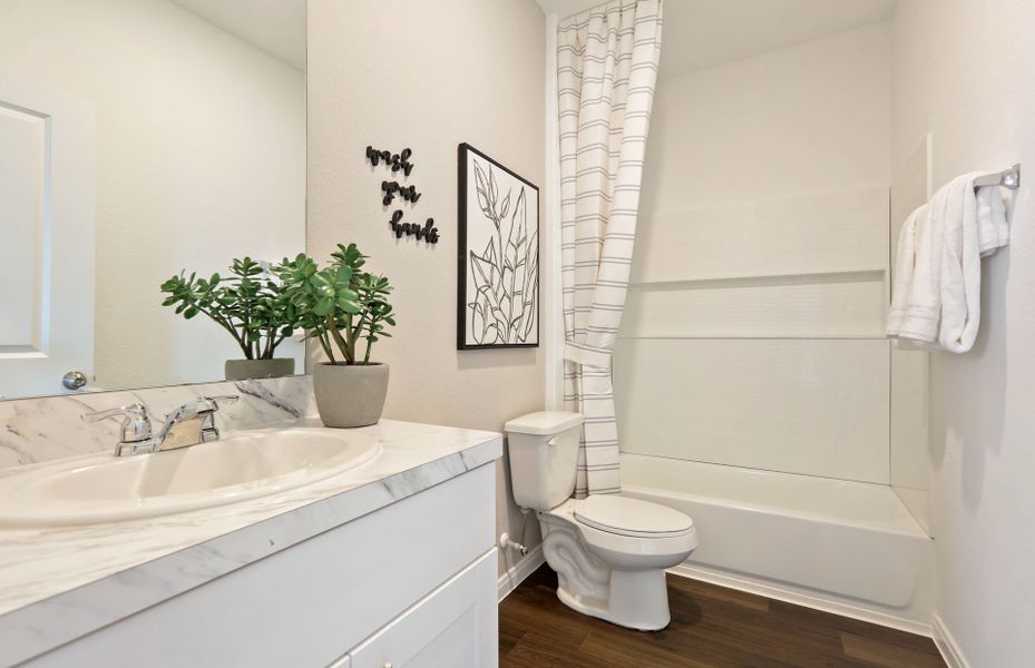 Representative furnished interior of a home built from the Taft by Pulte Homes in Crosswinds, Kyle (Image 5).