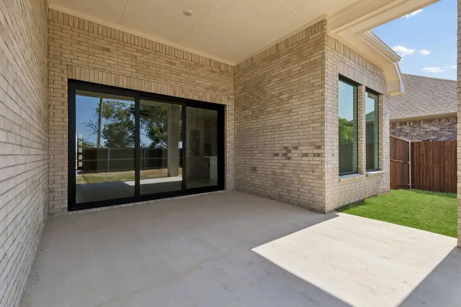 Front exterior of a new home in Parkmont – Timberbrook, Justin, TX, highlighting curb appeal (Image 30). Front exterior of a new home in Parkmont – Timberbrook, Justin, TX, highlighting curb appeal (Image 30).
