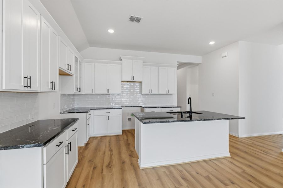 Furnished interior view inside a new home in Aldeana, Bonney (Image 14).