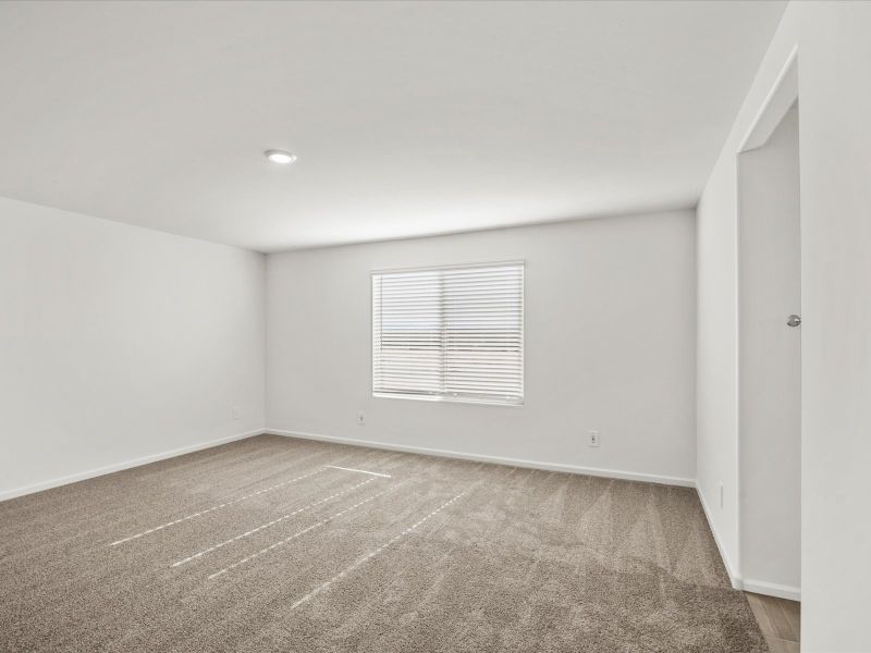 Spacious, unfurnished interior of a new home in Las Patrias at Star Valley Phase III - Premier Series, Tucson (Image 11).