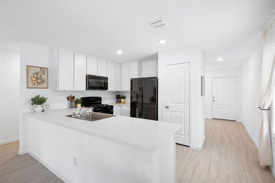 Furnished interior view inside a new home in Mobberly Farms, Pilot Point (Image 5).