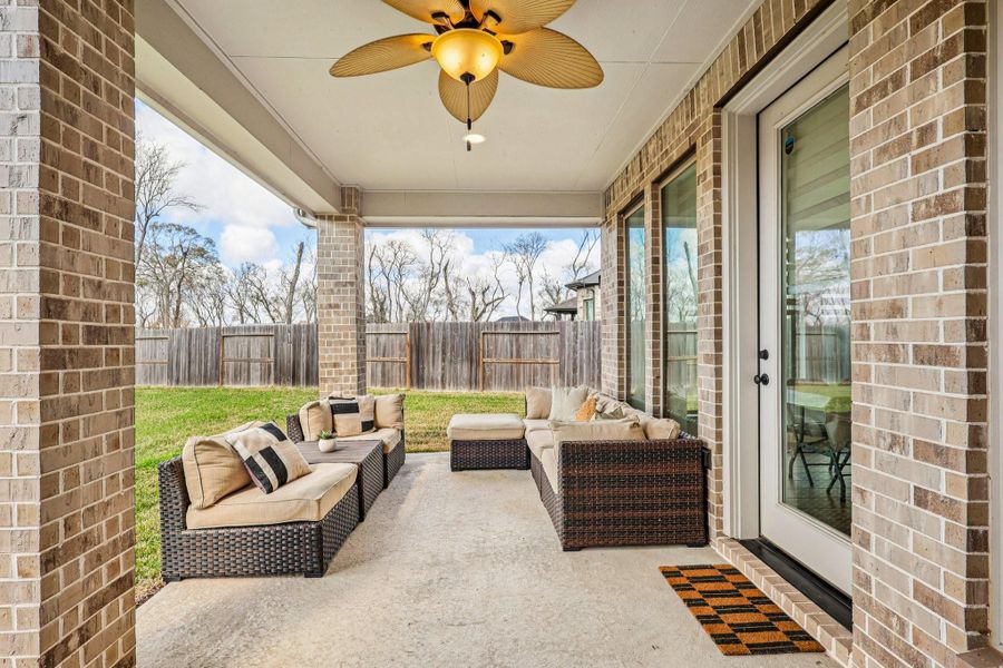 Exterior details and patio area of a home in Sienna, Missouri City (Image 27).