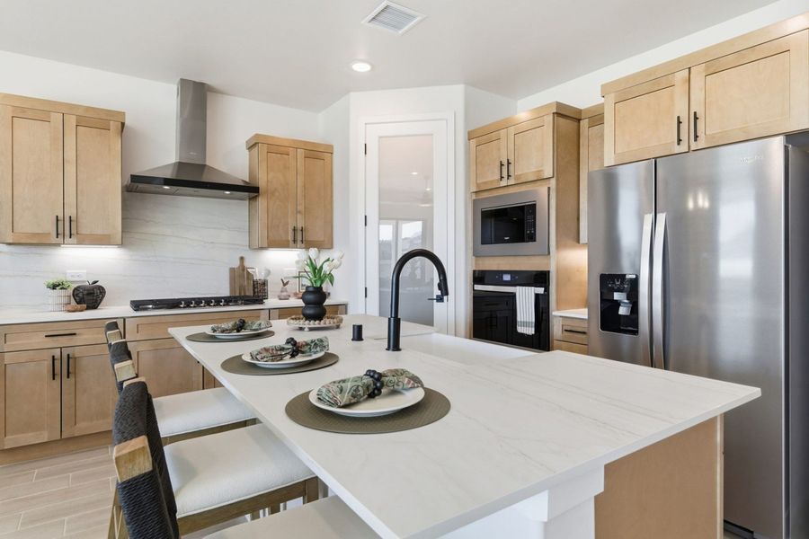 Representative furnished interior of a home built from the Valencia by Hakes Brothers in Verdancia, El Paso (Image 13).