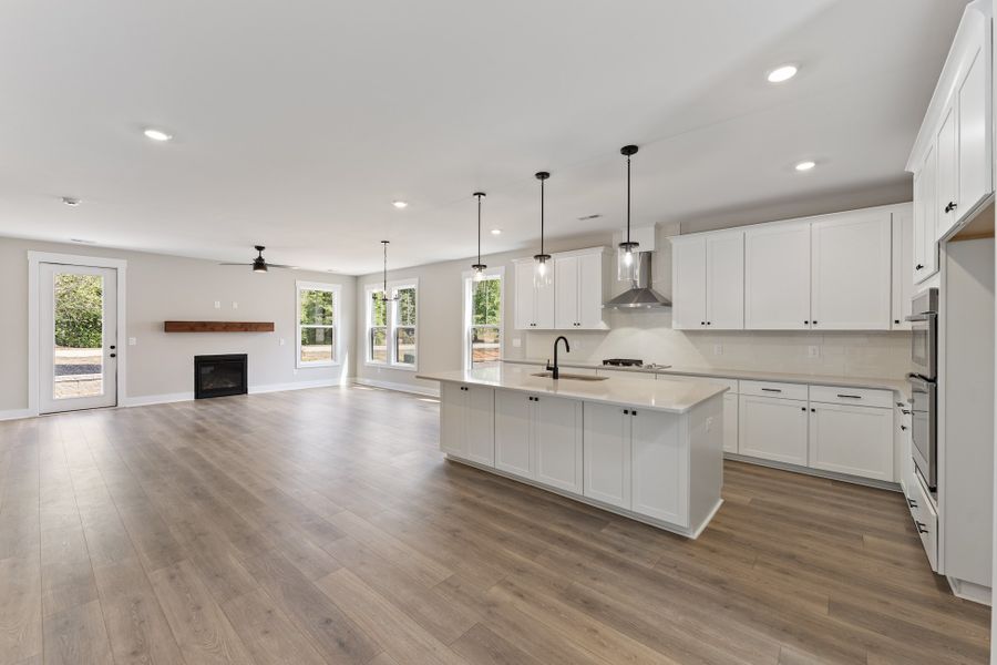Representative furnished interior of a home built from the Bowman by Hunter Quinn Homes in Landing at Clemson Marina, Seneca (Image 4).