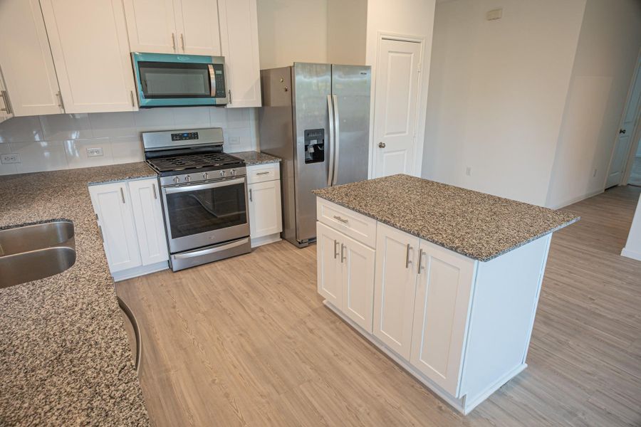 Furnished interior view inside a new home in Mustang Ridge, Alvin (Image 15).