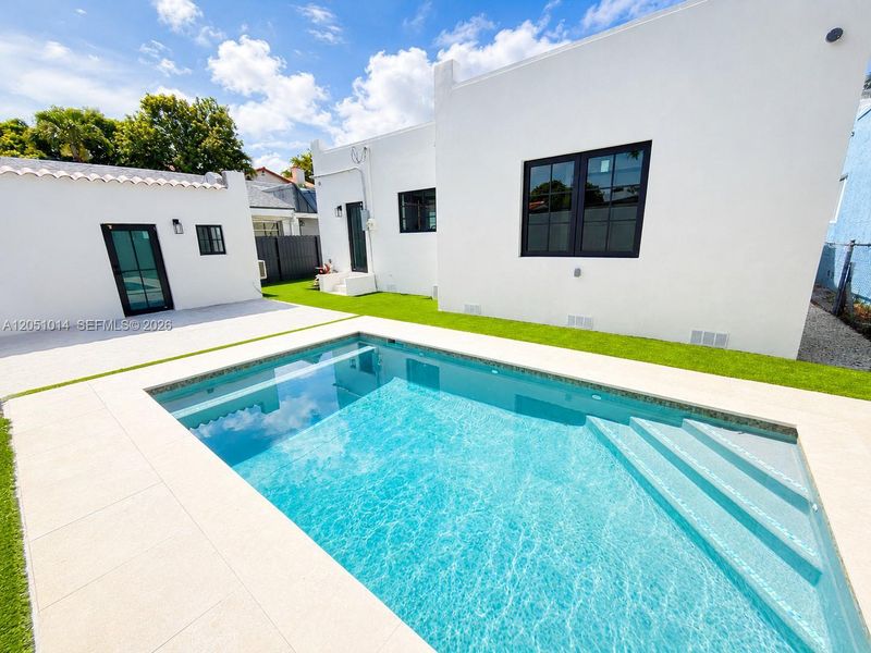 Exterior details and patio area of a home in , Miami (Image 3). Exterior details and patio area of a home in , Miami (Image 3).
