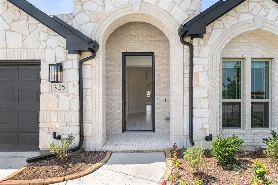 Exterior details and patio area of a home in Grand Heritage, Lavon (Image 4).