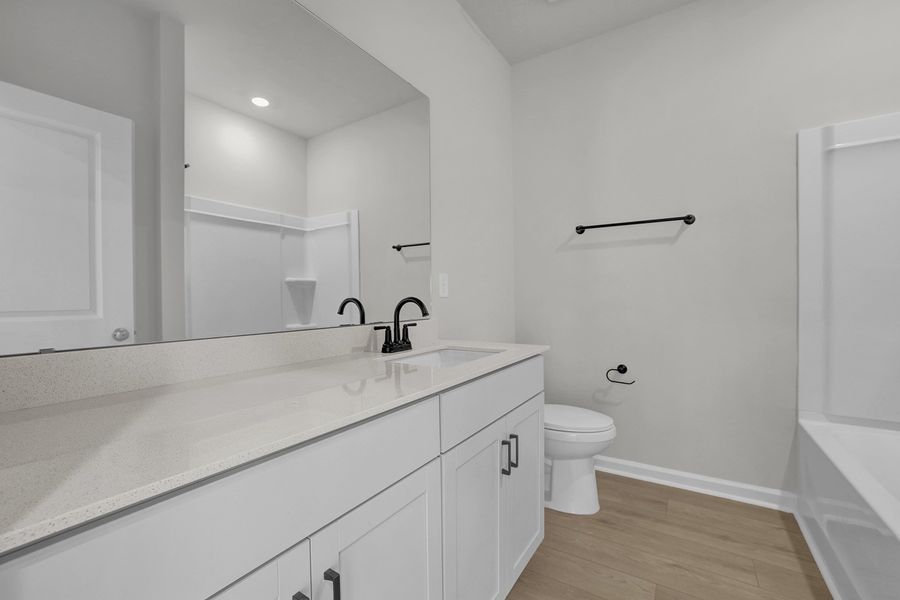 Furnished interior view inside a new home in Grand Park, Leland (Image 10).