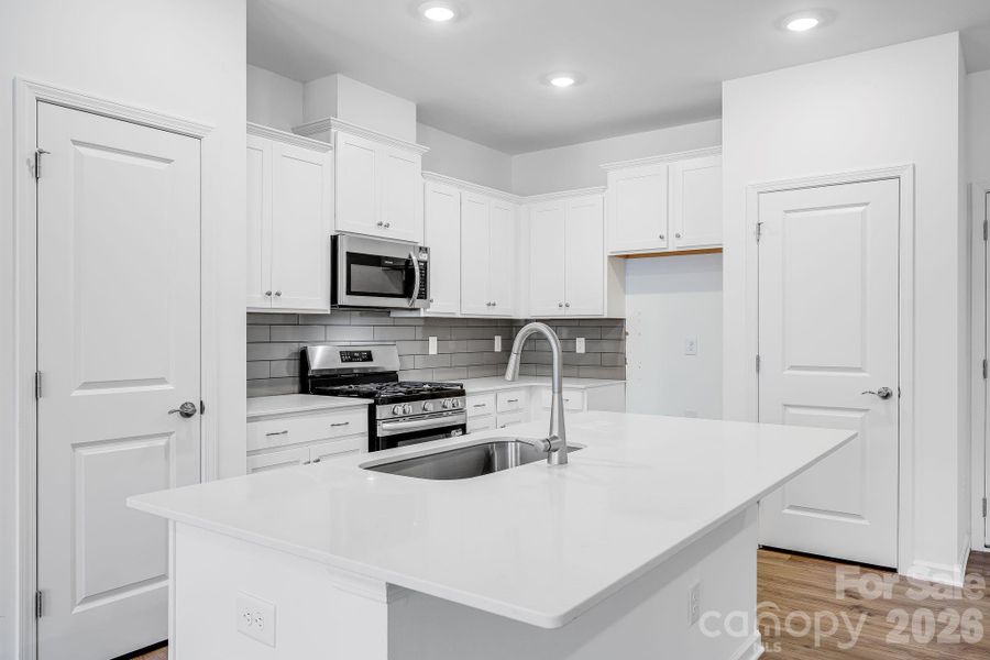 Furnished interior view inside a new home in Cannon Village, York (Image 4).
