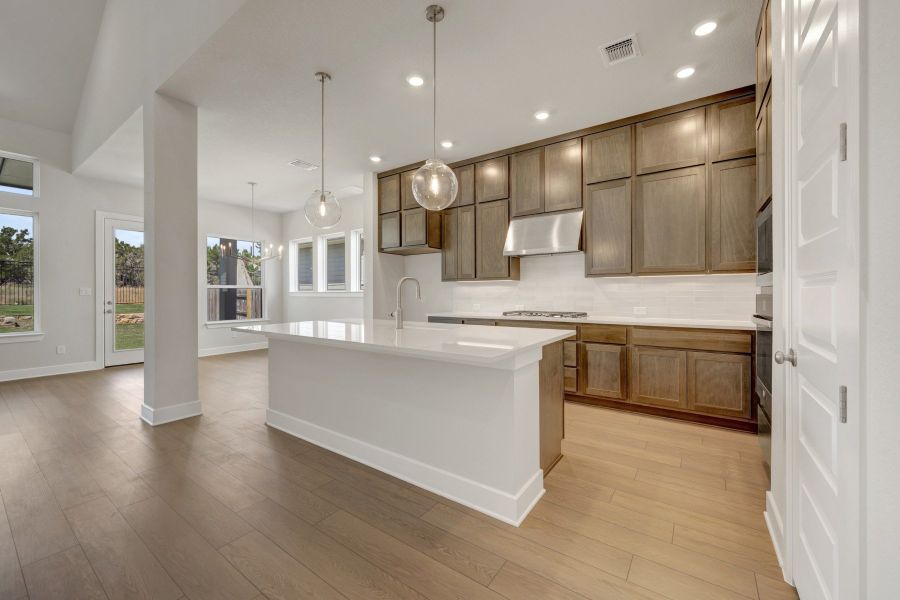 Furnished interior view inside a new home in Headwaters 50' - Executive Series, Dripping Springs (Image 6). Furnished interior view inside a new home in Headwaters 50' - Executive Series, Dripping Springs (Image 6).
