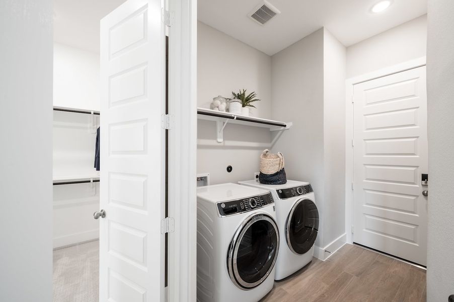 Representative furnished interior of a home built from the Verdin by Tri Pointe Homes in Pecan Ridge, Fulshear (Image 99).