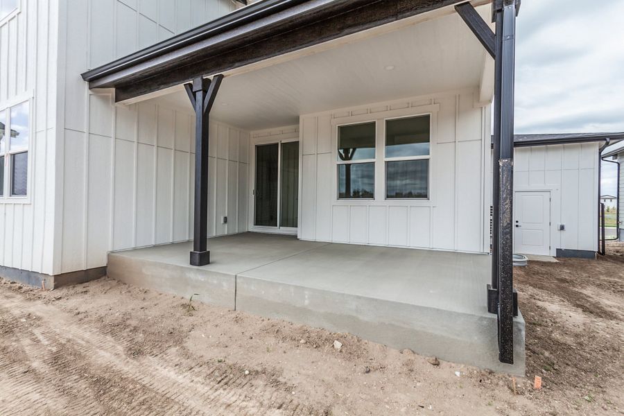 Exterior details and patio area of a home in Prairie Song, Windsor (Image 4).