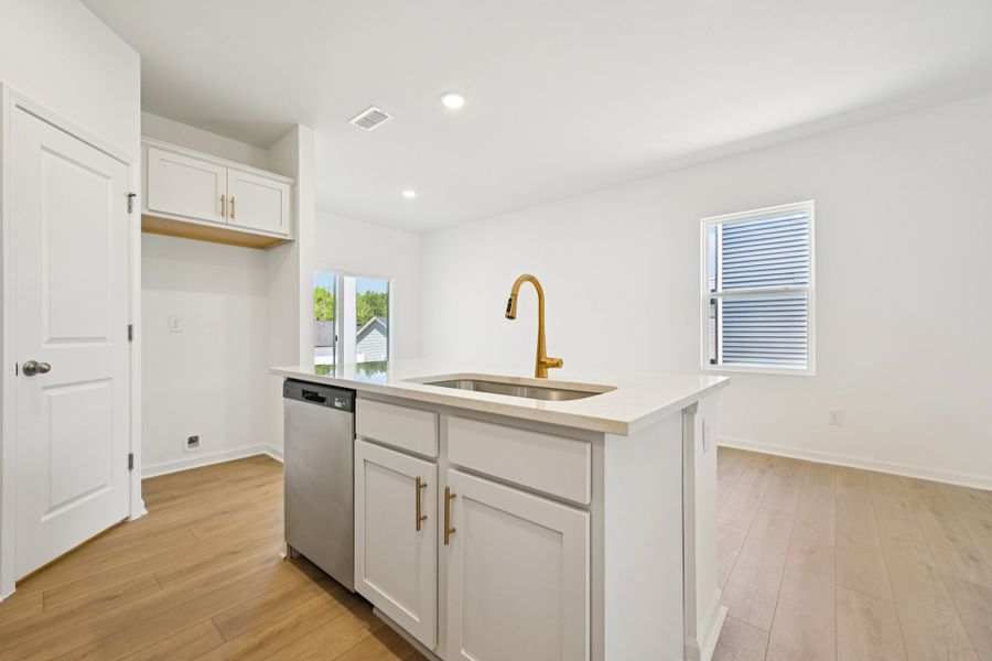 Representative furnished interior of a home built from the Grove by Ashton Woods in Middleton Farms, Middlesex (Image 9).