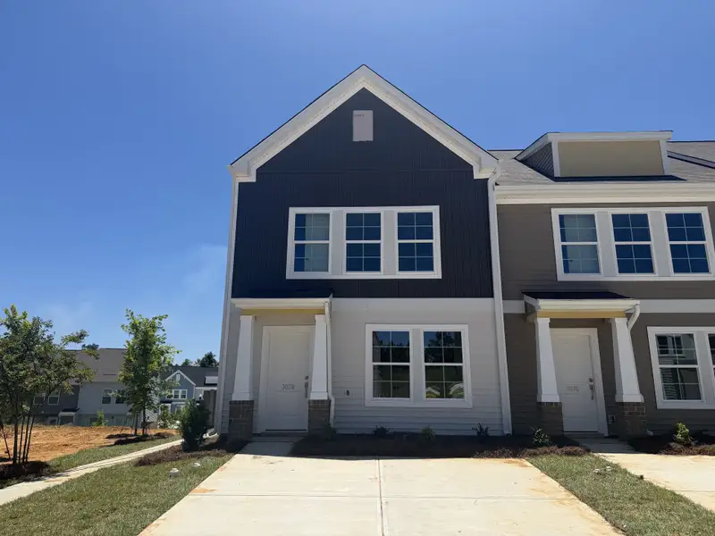Front exterior of a new home in Astoria, Columbia, SC, highlighting curb appeal (Image 1). Front exterior of a new home in Astoria, Columbia, SC, highlighting curb appeal (Image 1).