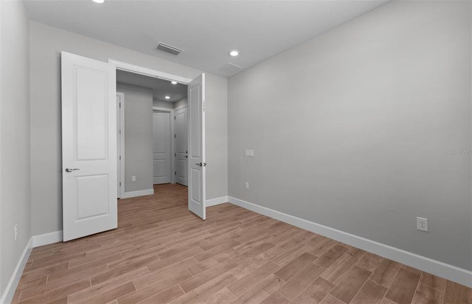 Spacious, unfurnished interior of a new home in Arbor Oaks, North Port (Image 19). Spacious, unfurnished interior of a new home in Arbor Oaks, North Port (Image 19).