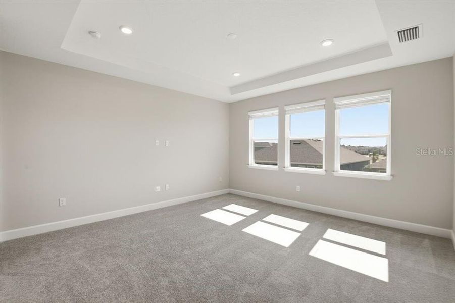 Spacious, unfurnished interior of a new home in Harvest at Ovation, Winter Garden (Image 31).