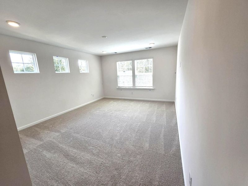 Spacious, unfurnished interior of a new home in Creekside at Andrews, Summerville (Image 13).
