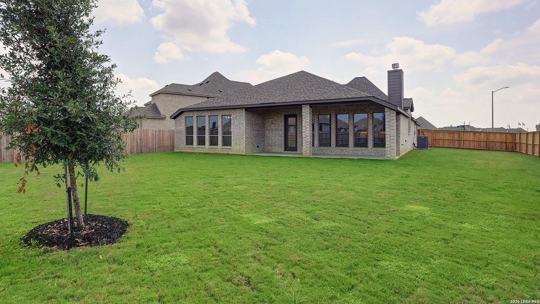 Exterior details and patio area of a home in Alsatian Oaks, Castroville (Image 4).