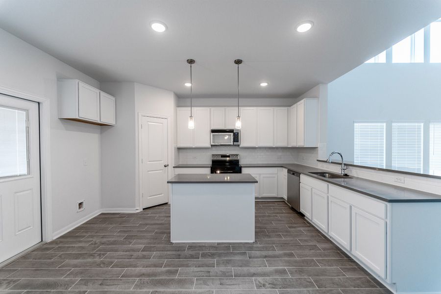 Furnished interior view inside a new home in Hannah Heights, Seguin (Image 3).
