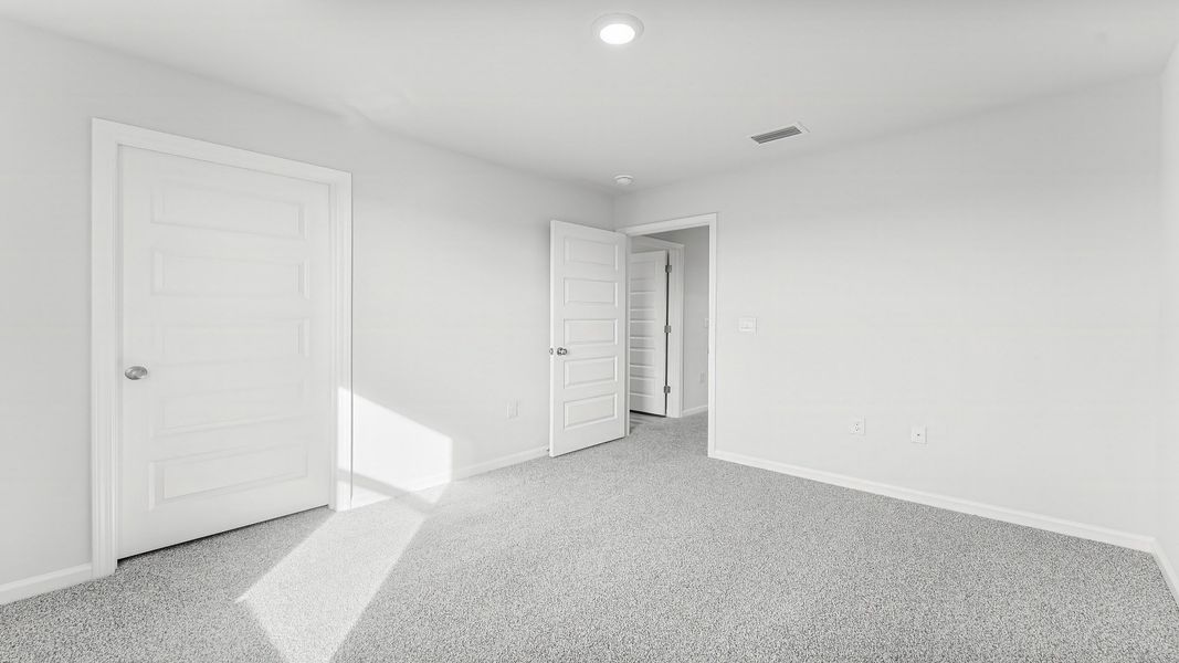 Representative unfurnished interior of a home built from the The Aisle by D.R. Horton in Titus Park, Panama City (Image 33).