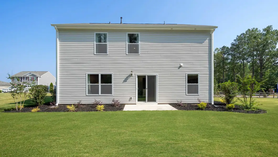 Exterior details and patio area of a home in Lightwood Cottages, Moore (Image 3).