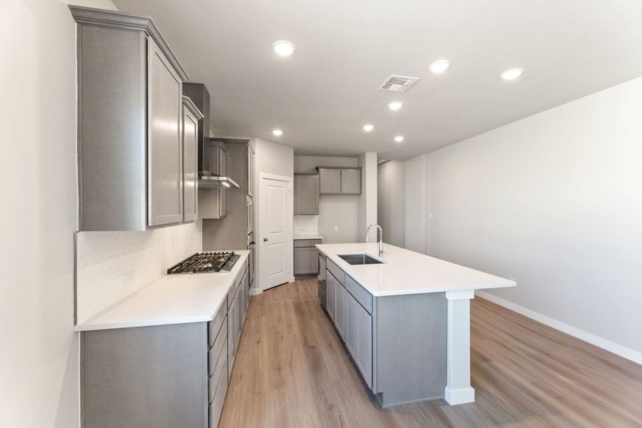Furnished interior view inside a new home in Hunters Ranch, San Antonio (Image 5).