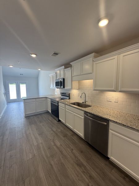 Furnished interior view inside a new home in Legacy Fields, Pleasant View (Image 4).