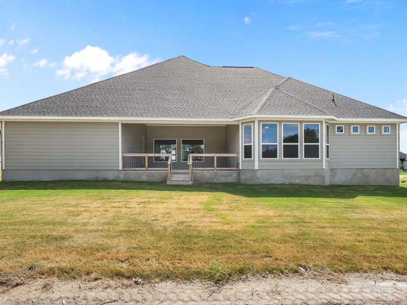 Exterior details and patio area of a home in Potranco Oaks, Castroville (Image 3).
