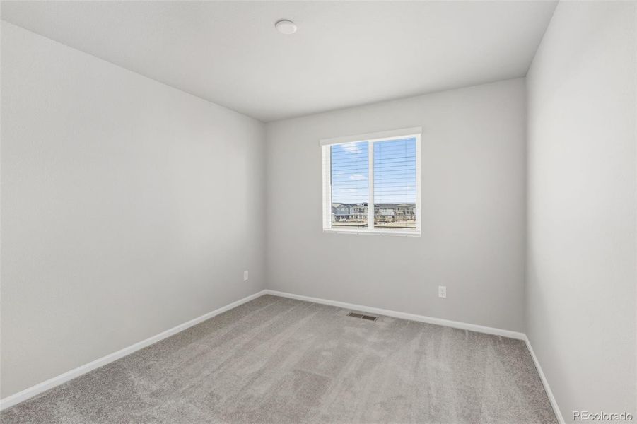 Spacious, unfurnished interior of a new home in Woodrose at Painted Prairie, Aurora (Image 23).