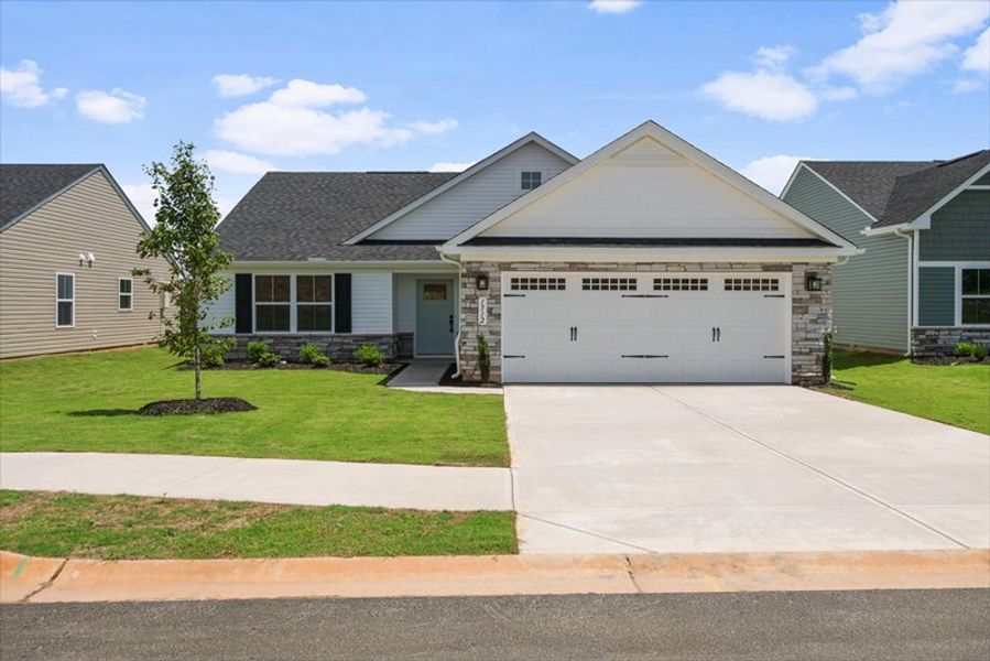 Front exterior of a new home in Claiborne Ridge, Landrum, SC, highlighting curb appeal (Image 1). Front exterior of a new home in Claiborne Ridge, Landrum, SC, highlighting curb appeal (Image 1).