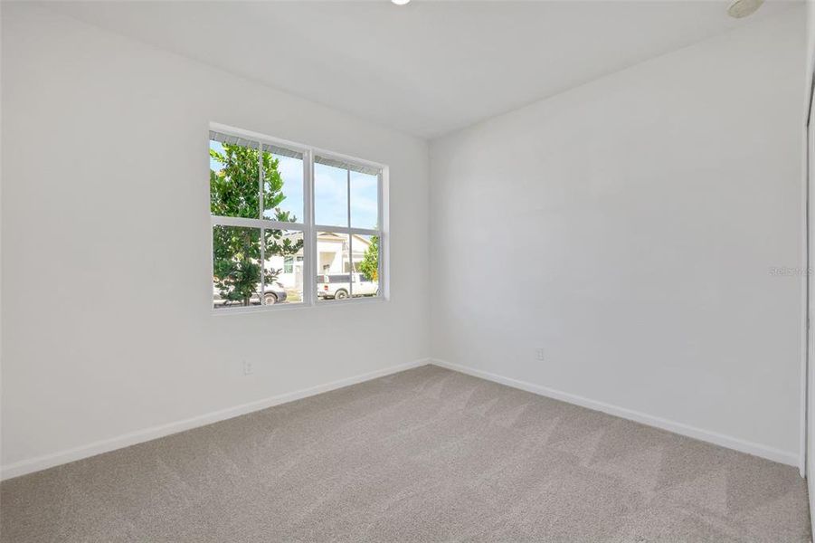 Spacious, unfurnished interior of a new home in Brystol North at Wylder, Port St. Lucie (Image 30).