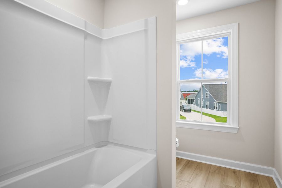 Spacious, unfurnished interior of a new home in Waterbridge, Myrtle Beach (Image 27).
