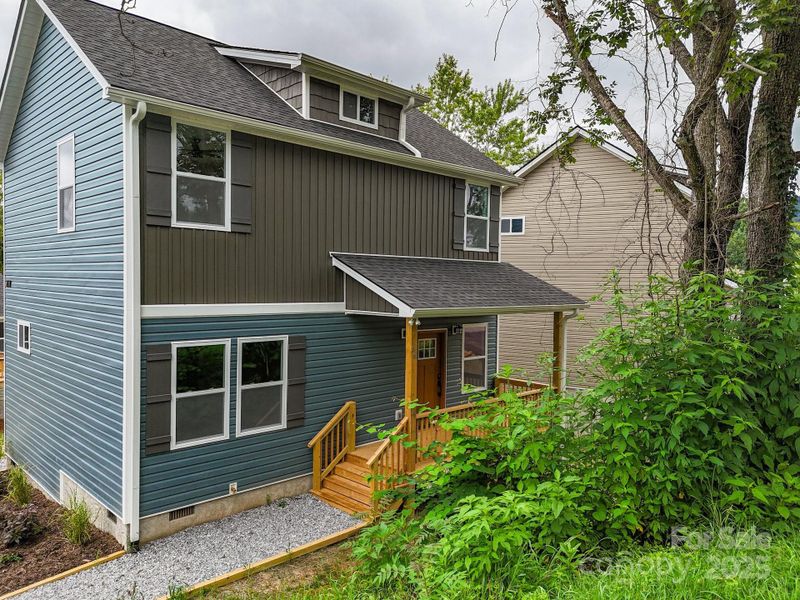 Front exterior of a new home in , Asheville, NC, highlighting curb appeal (Image 22).