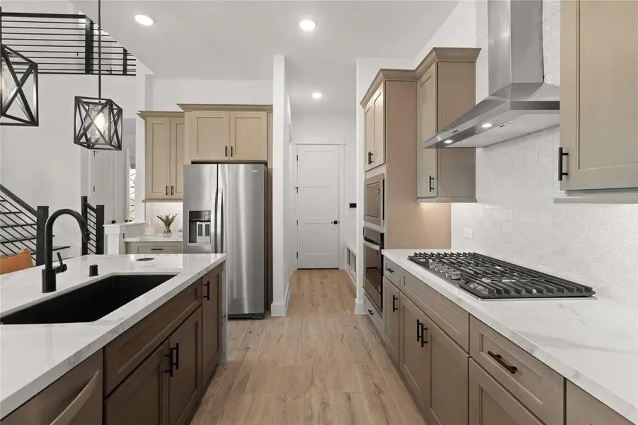 *Model Representation - Abundant cabinet space in kitchen