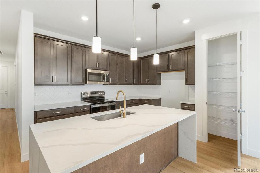 Furnished interior view inside a new home in Painted Prairie, Aurora (Image 10).