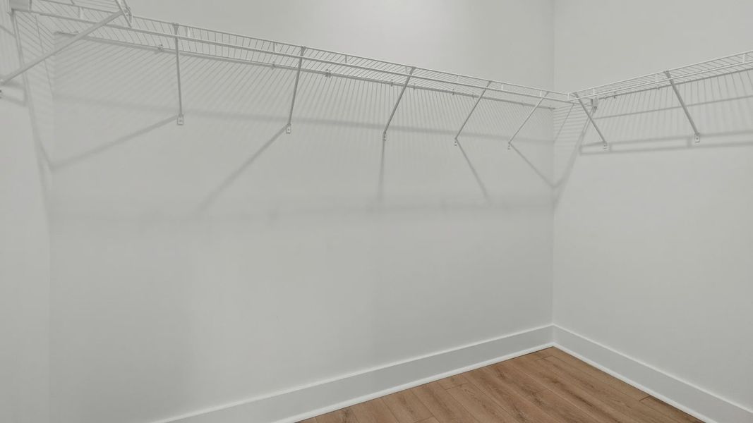 Furnished interior view inside a new home in Bluffs at Sun Colony, Longs (Image 18).