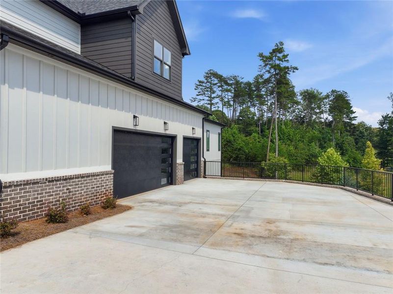 Front exterior of a new home in , Gainesville, GA, highlighting curb appeal (Image 27). Front exterior of a new home in , Gainesville, GA, highlighting curb appeal (Image 27).