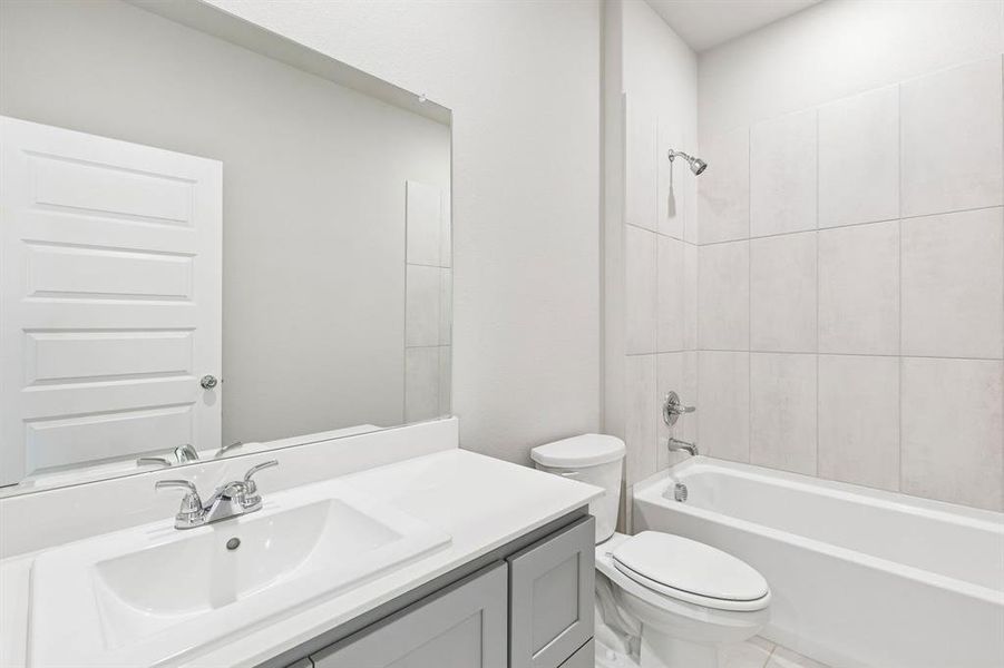 Bathroom in the Haylee home plan by Trophy Signature Homes - REPRESENTATIVE PHOTO Bathroom in the Haylee home plan by Trophy Signature Homes - REPRESENTATIVE PHOTO