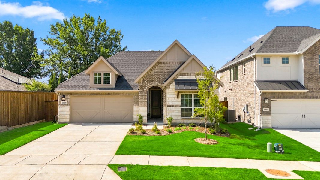 Front exterior of a new home in Taylor Estates, Corinth, TX, highlighting curb appeal (Image 25).