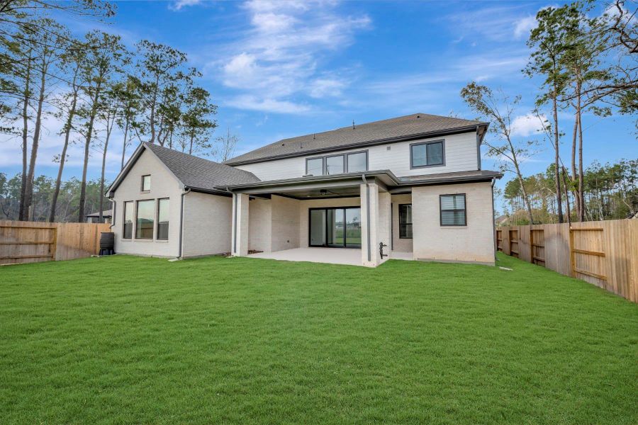 Exterior details and patio area of a home in ARTAVIA 65' Homesites, Conroe (Image 3).